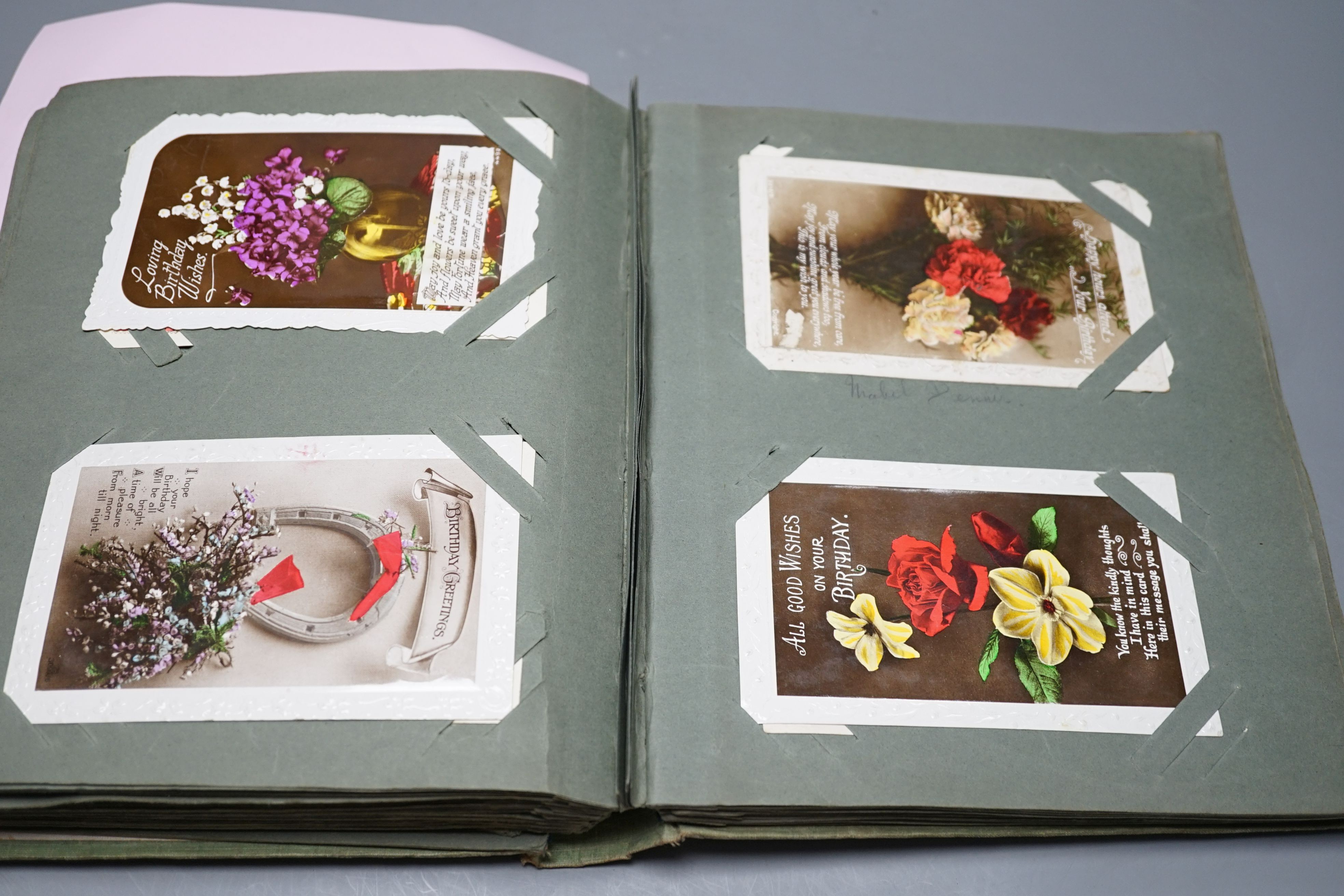Two postcard album and contents